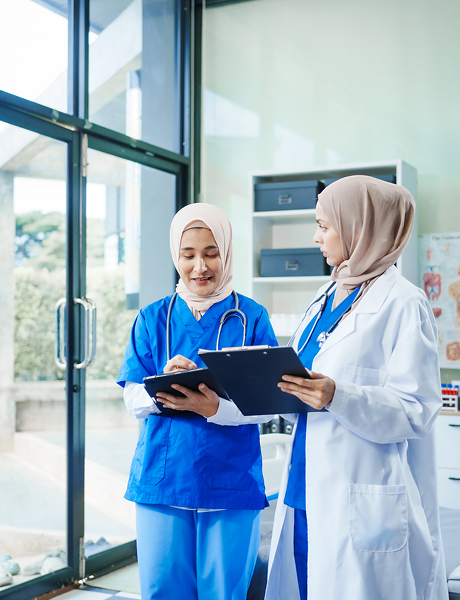 Medical professionals working with advanced equipment